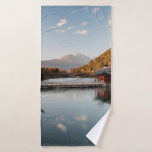 BROWN AND GREEN PAGODA ON BODY OF WATER NEAR MOUNT BATH TOWEL