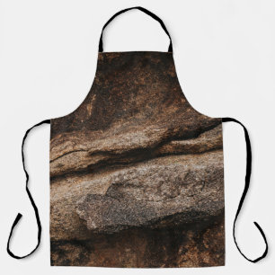 Brown and grey rock formation apron