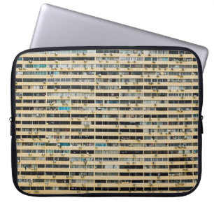 Brown and white concrete building laptop sleeve