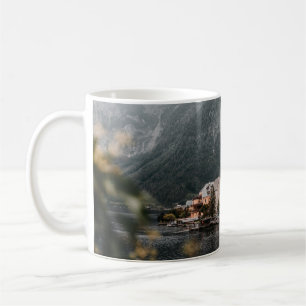 BROWN AND WHITE CONCRETE BUILDING NEAR BODY OF WAT COFFEE MUG