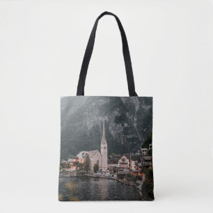BROWN AND WHITE CONCRETE BUILDING NEAR BODY OF WAT TOTE BAG