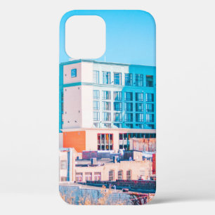 BROWN AND WHITE CONCRETE BUILDING UNDER BLUE SKY iPhone 12 CASE