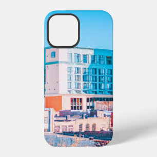 BROWN AND WHITE CONCRETE BUILDING UNDER BLUE SKY iPhone 12 CASE