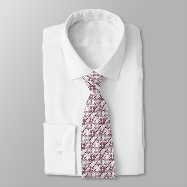 brown and white floral pattern tie (Tied)