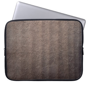 Brown and white floral textile laptop sleeve