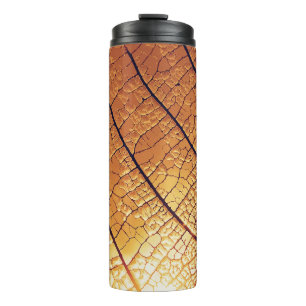 Brown and white leaf print textile thermal tumbler