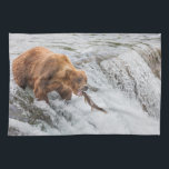 Brown Bear Catches Red Salmon Tea Towel<br><div class="desc">Brown bears fish for red salmon at the falls of the Brooks River,  Katmai National Park,  southwest,  Alaska.</div>