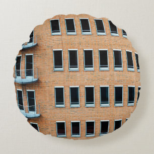 Brown brick wall building round cushion