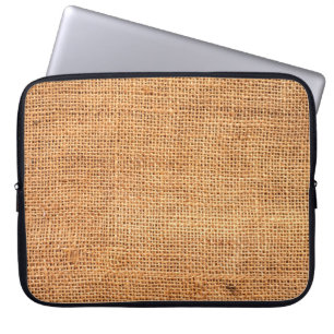 Brown burlap cloth background or sack cloth laptop sleeve