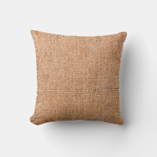 Brown burlap laying on white sheet. Abstract backg Cushion