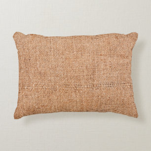 Brown burlap laying on white sheet. Abstract backg Decorative Cushion