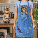 Brown Cat in Faux Denim Pocket with Custom Name Apron<br><div class="desc">This fun novelty apron includes a faux (printed) denim / blue jean look and includes a cartoon brown kitty cat that appears as if it's sitting inside a pocket! The design also includes "patches" (printed) that resemble the silhouettes of a cat chasing a bird and three paw prints. Use the...</div>