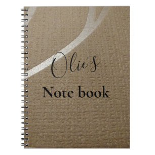 Brown colour spiral notebook with a textured look.