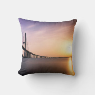 BROWN CONCRETE BRIDGE DURING DAYTIME CUSHION