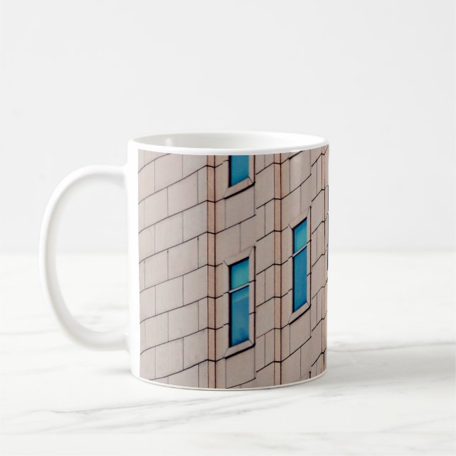 BROWN CONCRETE BUILDING DURING DAYTIME COFFEE MUG (Left)