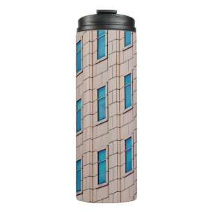BROWN CONCRETE BUILDING DURING DAYTIME THERMAL TUMBLER