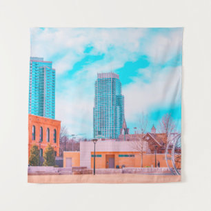 BROWN CONCRETE BUILDING NEAR BARE TREES UNDER BLUE TAPESTRY