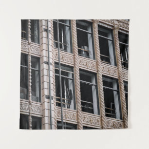 BROWN CONCRETE BUILDING WITH GLASS WINDOWS TAPESTRY