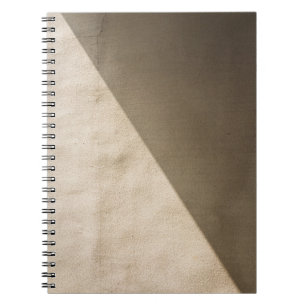 Brown concrete wall notebook