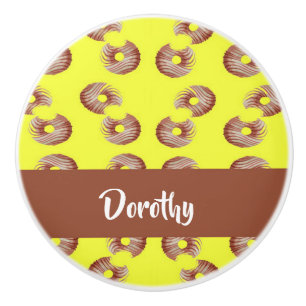 Brown doughnuts on yellow ceramic knob