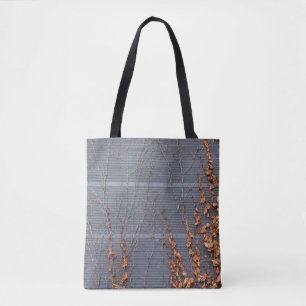 Brown dried leaves on water tote bag