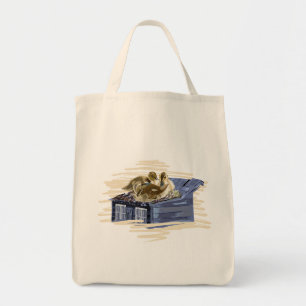 Brown ducks on the roof tote bag