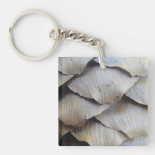 Brown fir cone pattern key ring