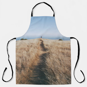 BROWN GRASS UNDER WHITE CLOUDS APRON