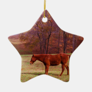 Brown horse in a grass field ceramic tree decoration