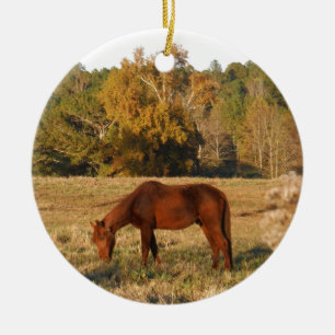Brown horse in  yellow tree field ceramic ornament