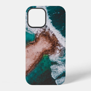 BROWN ISLAND SURROUNDED BY SEA WATER DURING DAYTIM iPhone 12 CASE