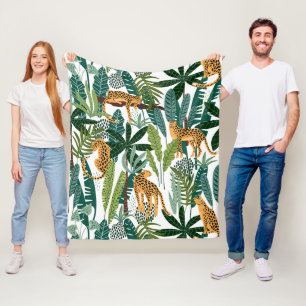 Brown leopard in tropical lush jungle leaves wrapp fleece blanket