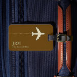Brown Monogrammed Aeroplane Traveller Luggage Tag<br><div class="desc">A simple and elegant item with the graphic image of an aeroplane on dark brown background,  with your name and initials...  to identify your luggage at the airport.</div>