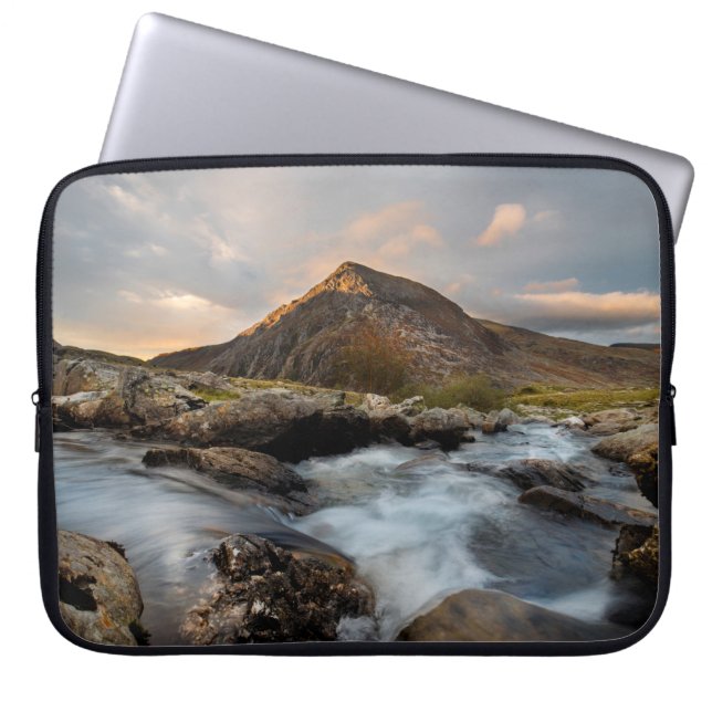BROWN MOUNTAIN NEAR BODY OF WATER UNDER CLOUDY SKY LAPTOP SLEEVE (Front)