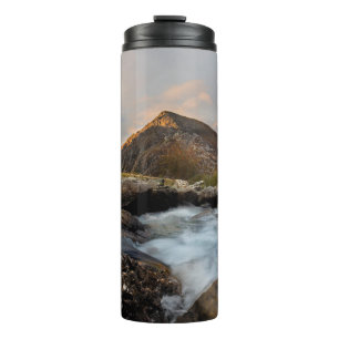 BROWN MOUNTAIN NEAR BODY OF WATER UNDER CLOUDY SKY THERMAL TUMBLER
