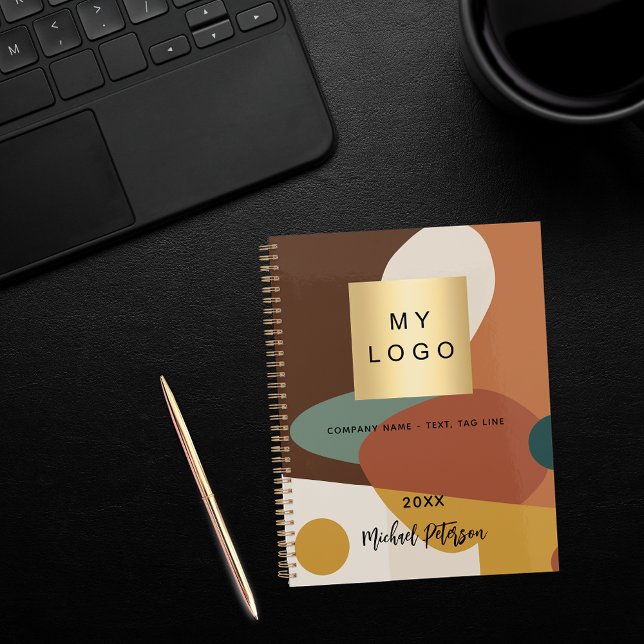 Brown orange retro pattern business logo notebook (Creator Uploaded)