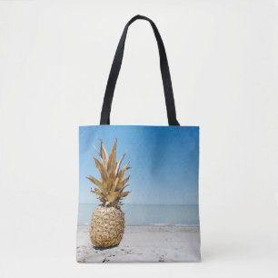 Brown pineapple fruit on seashore tote bag
