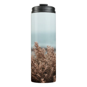 BROWN PLANT IN CLOSE UP PHOTOGRAPHY THERMAL TUMBLER