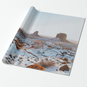 BROWN ROCK FORMATION ON WHITE SNOW COVERED GROUND WRAPPING PAPER