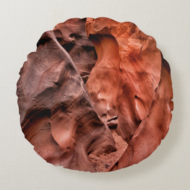 Brown rock formations round cushion (Front)