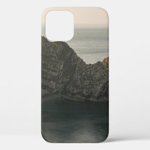 BROWN ROCKY MOUNTAIN BESIDE BODY OF WATER DURING D iPhone 12 CASE