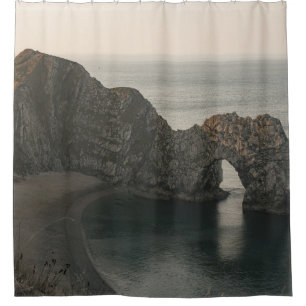 BROWN ROCKY MOUNTAIN BESIDE BODY OF WATER DURING D SHOWER CURTAIN