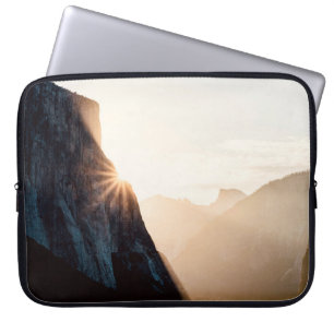 BROWN ROCKY MOUNTAIN DURING DAYTIME LAPTOP SLEEVE
