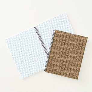 Brown rug featuring a detailed motif pattern with notebook