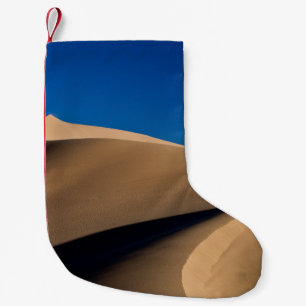 BROWN SAND UNDER BLUE SKY DURING DAYTIME SMALL CHRISTMAS STOCKING