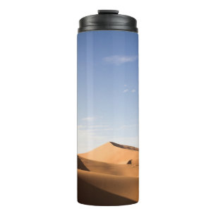BROWN SAND UNDER BLUE SKY DURING DAYTIME THERMAL TUMBLER