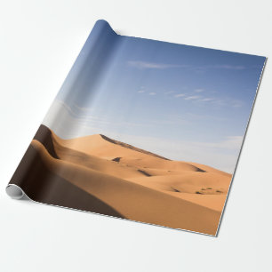 BROWN SAND UNDER BLUE SKY DURING DAYTIME WRAPPING PAPER