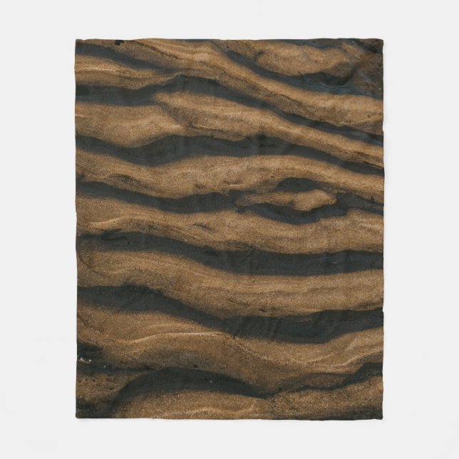 Brown sand with footprints during daytime fleece blanket (Front)
