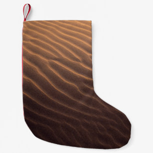Brown sand with water in the morning small christmas stocking