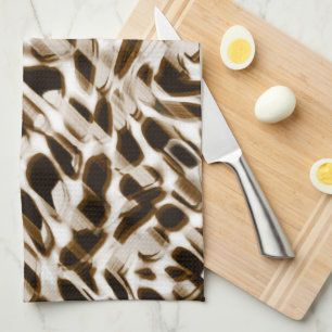 Brown twisting holes in motion, dark and whitish tea towel
